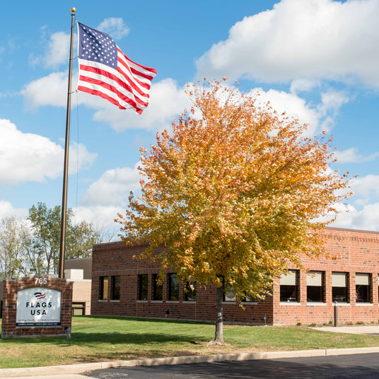 Brick building with American flag out in front