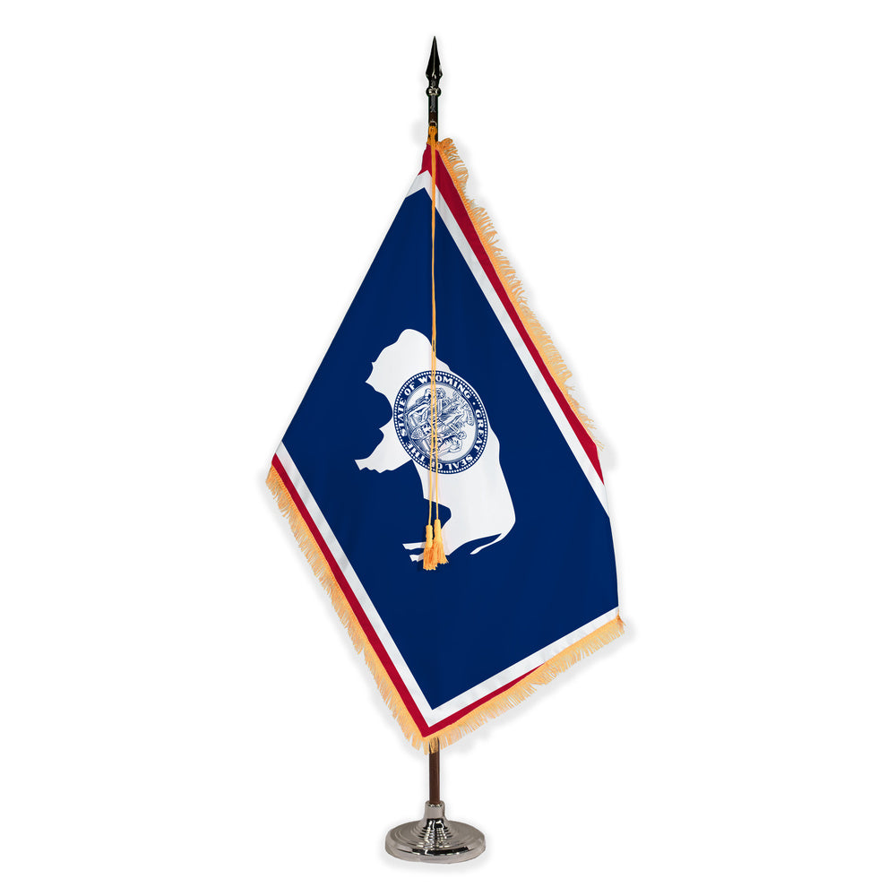 Wyoming deluxe oak indoor flag set with gold fringe on plastic stand