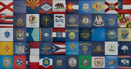 Grid of all 50 United States state flags arranged alphabetically in ten columns