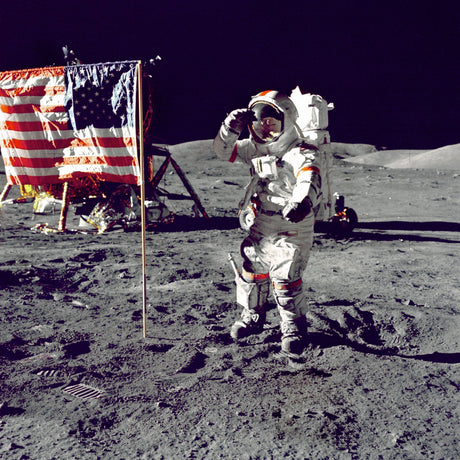 Apollo 17 commander Eugene Cernan saluting the American flag on the lunar surface.