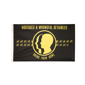 Yellow and black nylon Hostage and Wrongful Detainee Flag featuring three silhouetted faces, tally marks, and the words “Bring Them Home.”